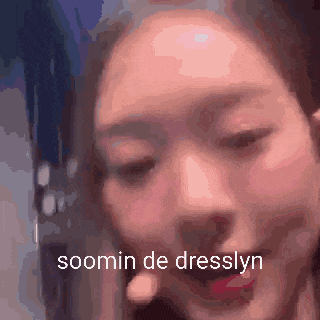 a close up of a woman 's face with the words soomin de dresslyn on the bottom