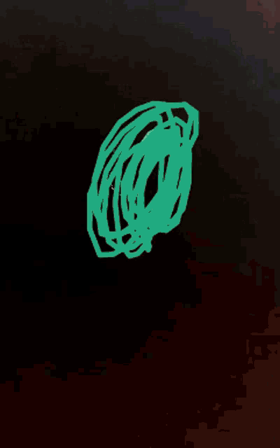 a close up of a woman 's face with a green circle in the background