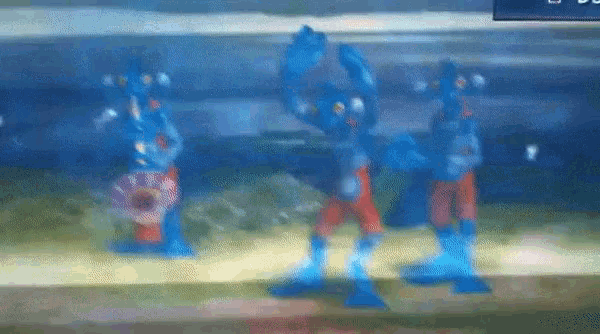 a painting of three blue figures standing next to each other with a blurred background