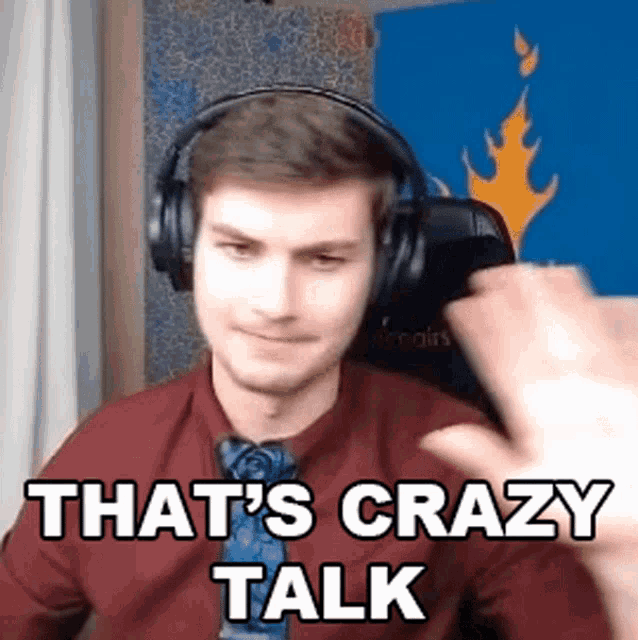 a man wearing headphones says that 's crazy talk .