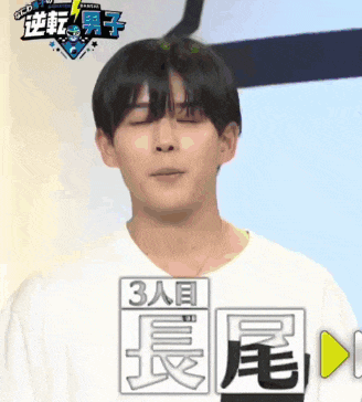 a man with his eyes closed wearing a shirt that says 3ae on it