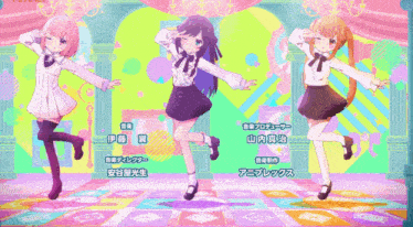 three anime girls are dancing in front of a colorful background with chinese characters