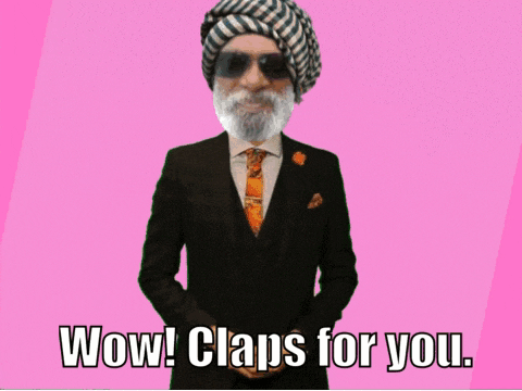 a man in a suit and hat is clapping with the words wow claps for you below him
