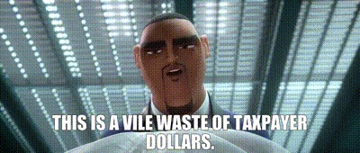 a man in a suit and tie is saying this is a vile waste of taxpayer dollars