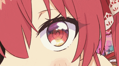 a close up of a girl 's eyes with a circle in the center