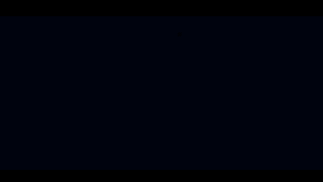 a blurred image of a person in a dark room with the fx logo in the corner
