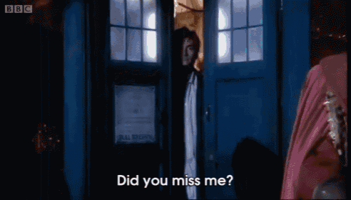 a man standing in a doorway with the words " did you miss me "