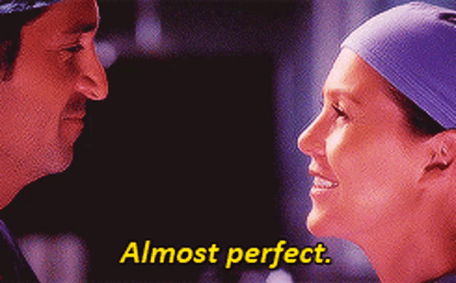 a man and a woman are looking at each other and the woman is saying almost perfect