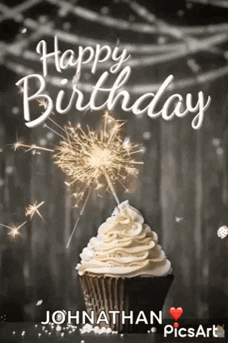 a happy birthday card with a cupcake and a sparkler .