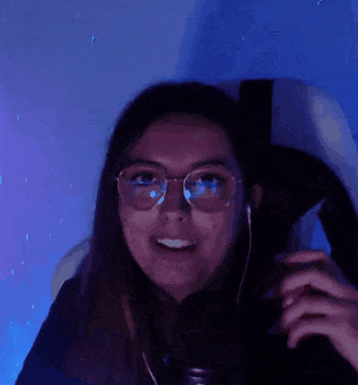 a woman wearing glasses and headphones is smiling with the word cheh in front of her