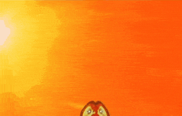 a close up of a red object with flames coming out of it 's mouth .