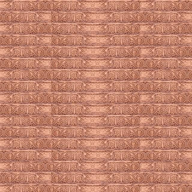 a close up of a brick wall with a pattern