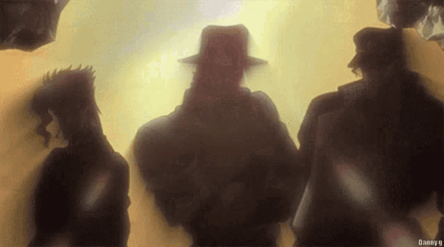 a silhouette of a man in a fedora standing next to another man