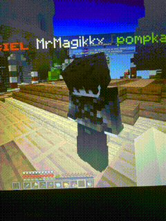 a screenshot of a minecraft game with the name mrmagikkx on the screen