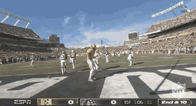 espn is showing a football game between the denver broncos and the new england patriots