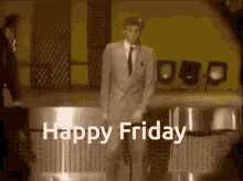 a man in a suit and tie is standing in front of a microphone with the words happy friday written on the bottom