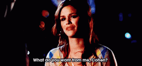 a woman is asking what do you want from me , cohen ?