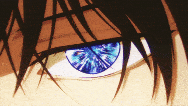 a close up of a person 's eye with a blue glow