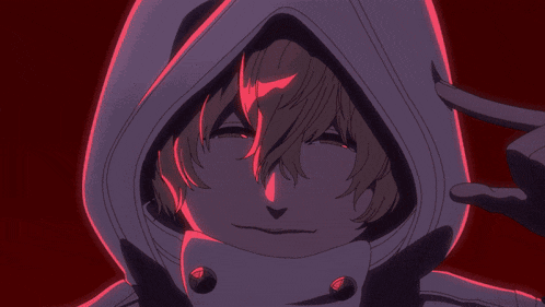 a person in a hooded jacket is standing in front of a fire .