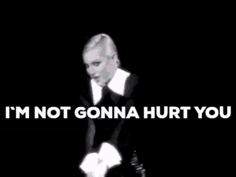 a black and white photo of a woman with the words " i 'm not gonna hurt you "