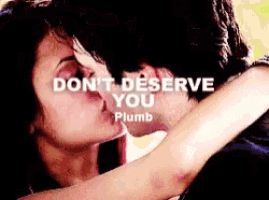 a man and woman kissing with the words " do n't deserve you plumb " written above them