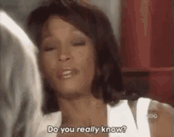 a woman is talking to another woman and asking her if she knows .