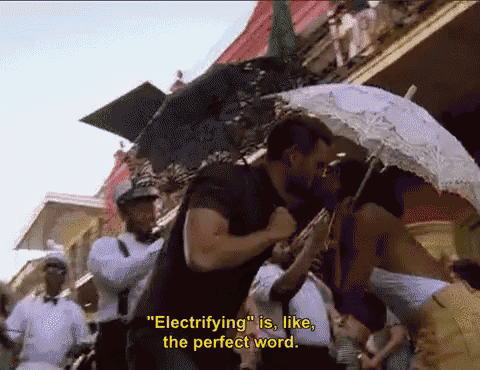 a man holding an umbrella with the words electrifying is like the perfect word