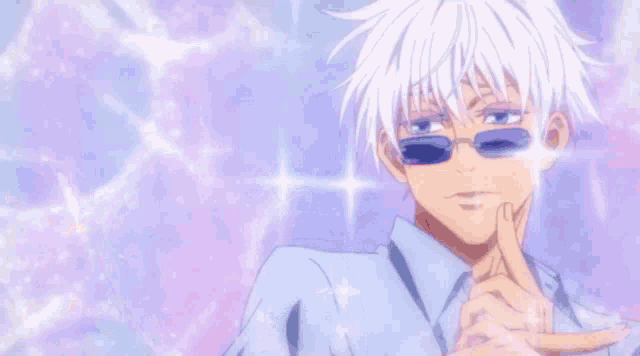 a man with white hair and sunglasses is making a peace sign