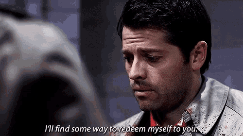 a man in a bloody jacket is talking to another man .