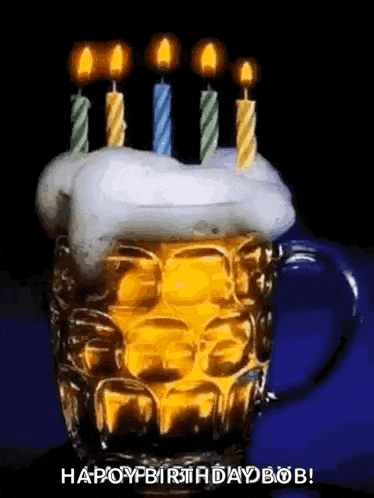 a beer mug with candles on top of it and the words `` happy birthday bob '' written below it .