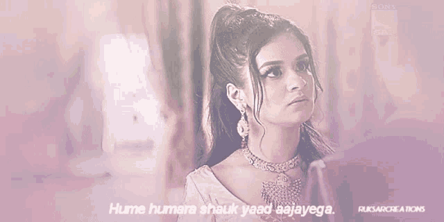 a woman with a ponytail is talking to someone with the words hume humara shauk yaad aajayega on the bottom