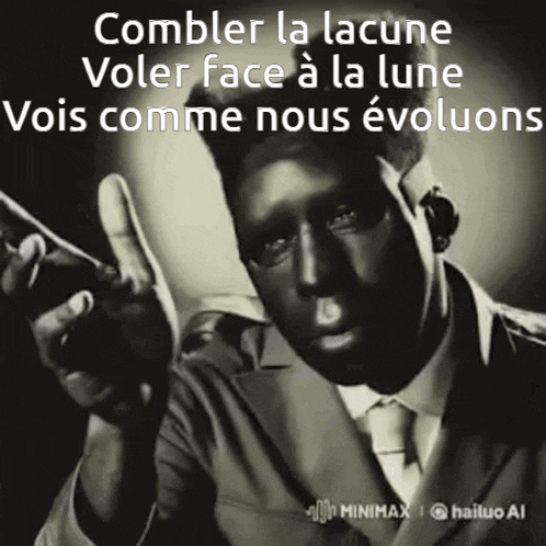 a black and white photo of a man in a suit and tie with a caption in french