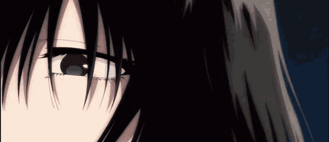 a close up of a girl 's face with black hair and white eyes