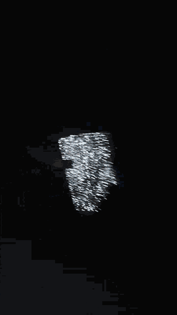 a drawing of a monkey 's face with white lines coming out of it