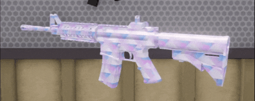 a rifle with a pink and blue geometric pattern on it