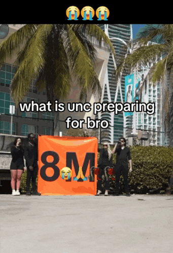 a group of people holding a sign that says 8m on it
