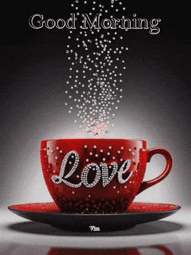 a red cup of coffee with the word love on it