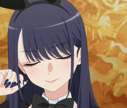 a close up of a girl wearing bunny ears