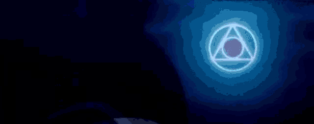 a blue circle with a triangle in the center