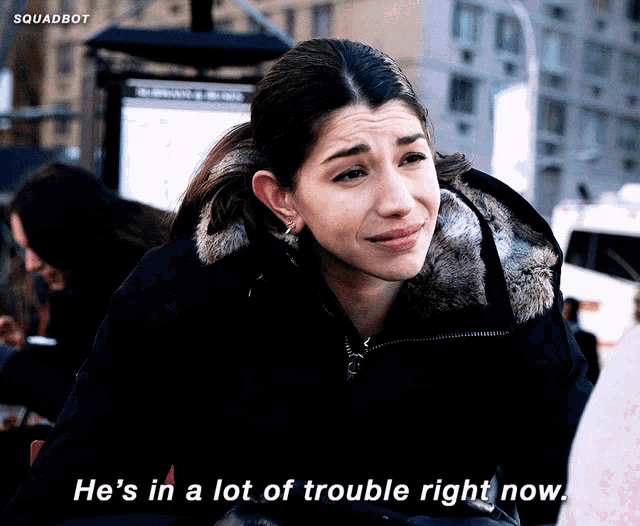 a woman says " he 's in a lot of trouble right now " in front of a bus stop