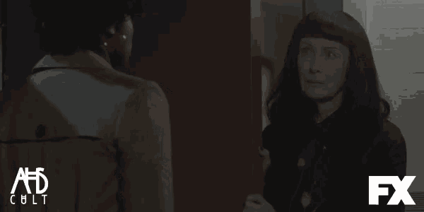 an ad for fx shows a woman talking to a man