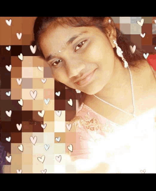 a woman 's face is surrounded by hearts in a pixelated image
