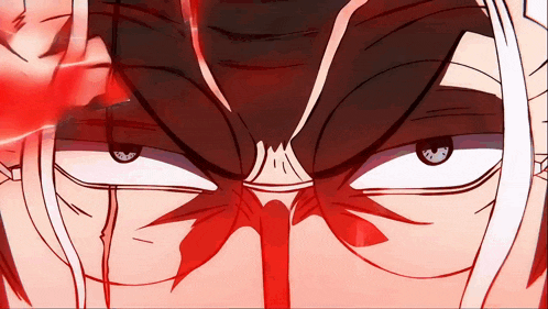 a close up of a person 's face with a red light coming out of it