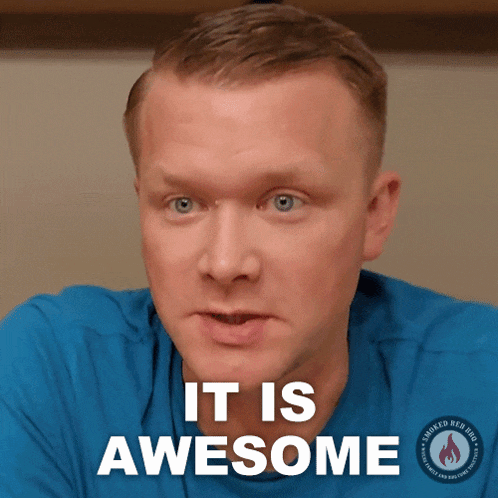 a man in a blue shirt says " it is awesome " in white letters