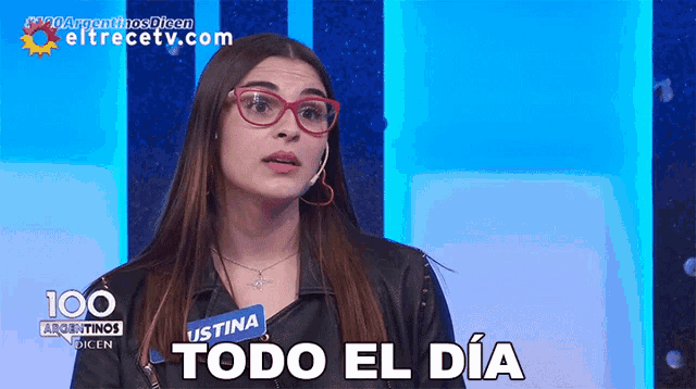 a woman with glasses and a name tag that says ustina todo el dia