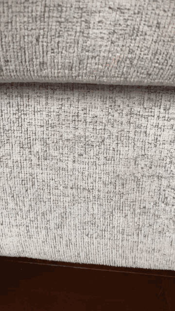 a close up of a couch cushion showing the texture