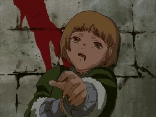 a girl in a green jacket is pointing her finger