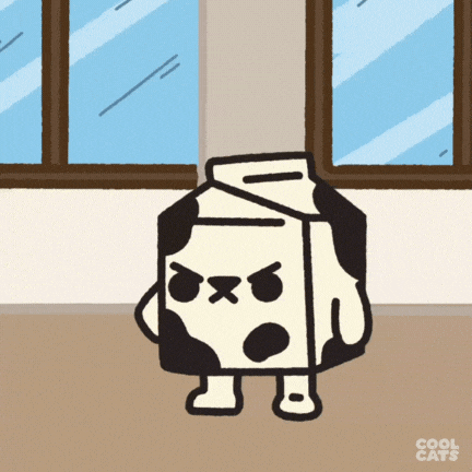 a cartoon drawing of a milk carton with an angry look on his face