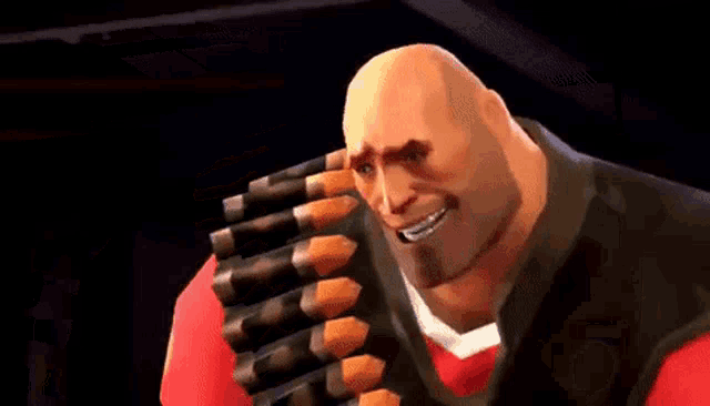 a bald man is holding a bunch of bullets in his hands and smiling .