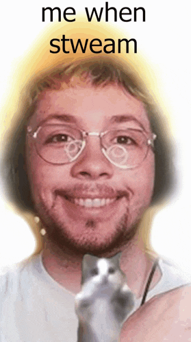a man with glasses and headphones is smiling while holding a cat with the words me when stweam above him